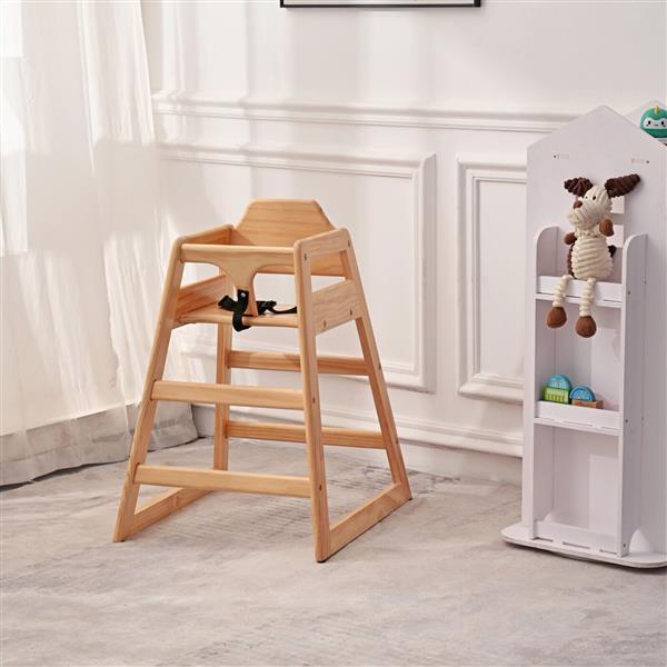 Wooden high chair in a room with a white wall and a shelf with toys.