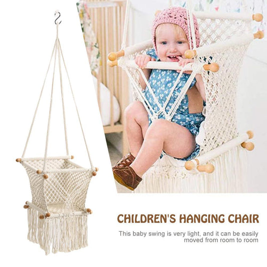Children's hanging chair with a baby sitting in it, on a white background.