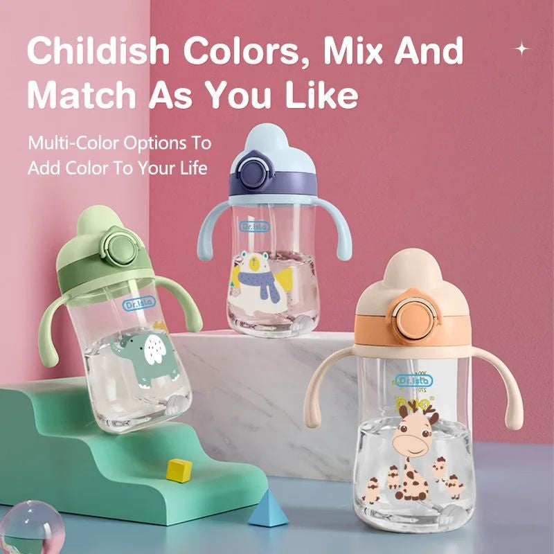 Three colorful children's sippy cups with animal designs on a pink background