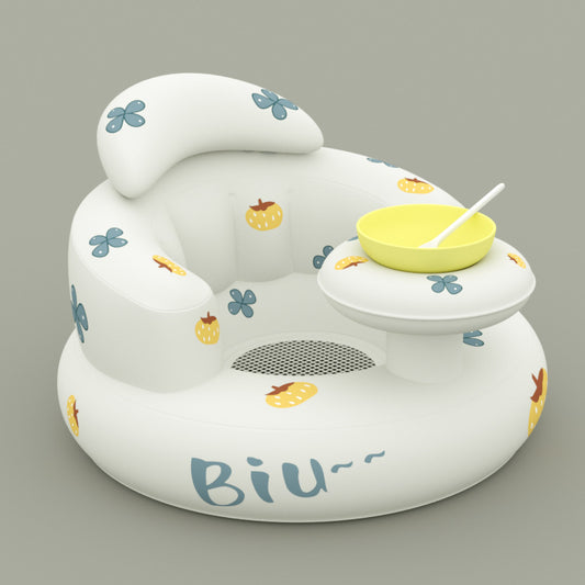 White inflatable baby seat with floral patterns and a yellow cup holder on a gray background