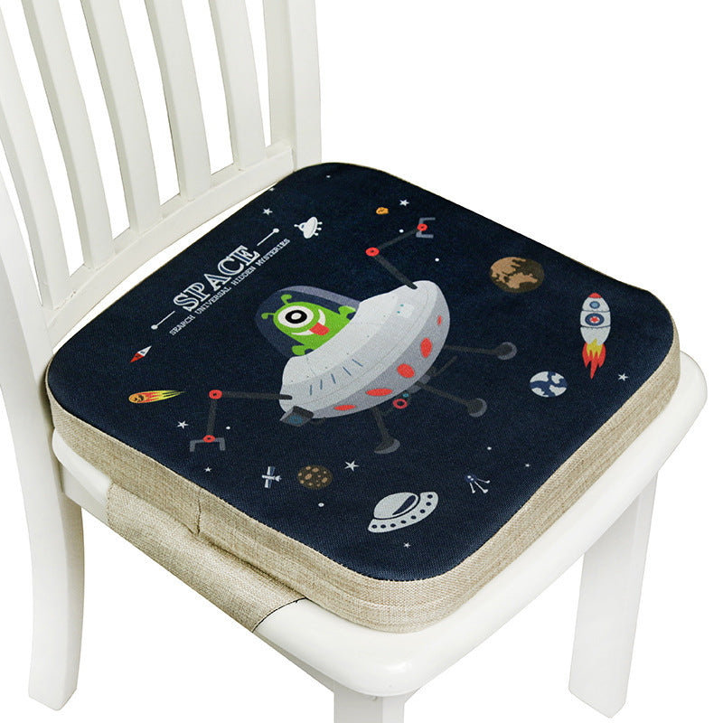 Space-themed cushion on a white chair with a blue background