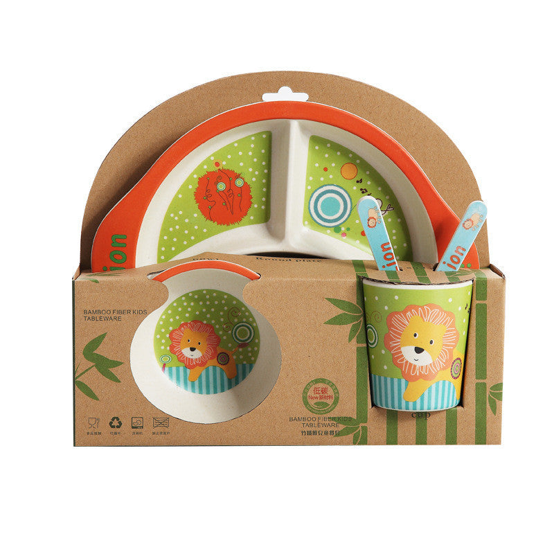 Children's tableware set with plates, cups, and cutlery in a cardboard box on a white background