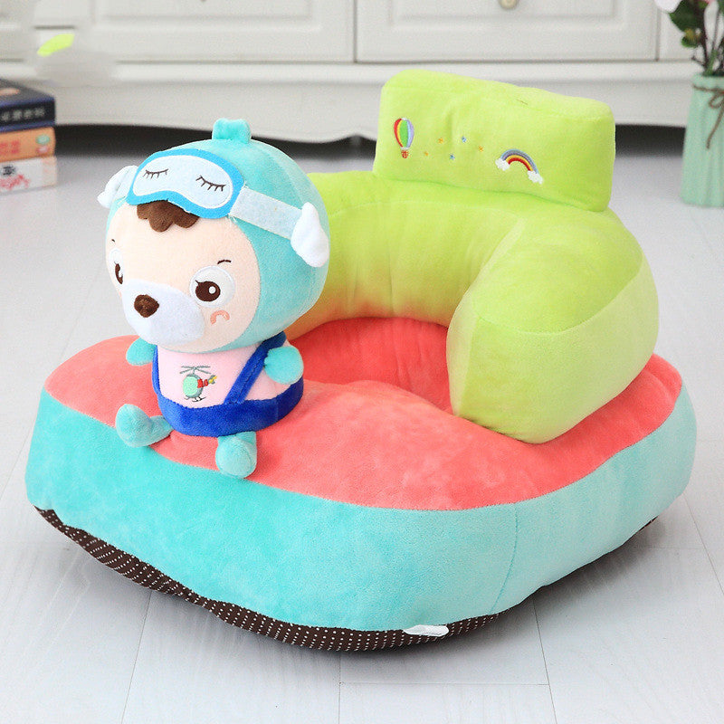 Colorful baby seat with a plush toy on a light wooden floor.