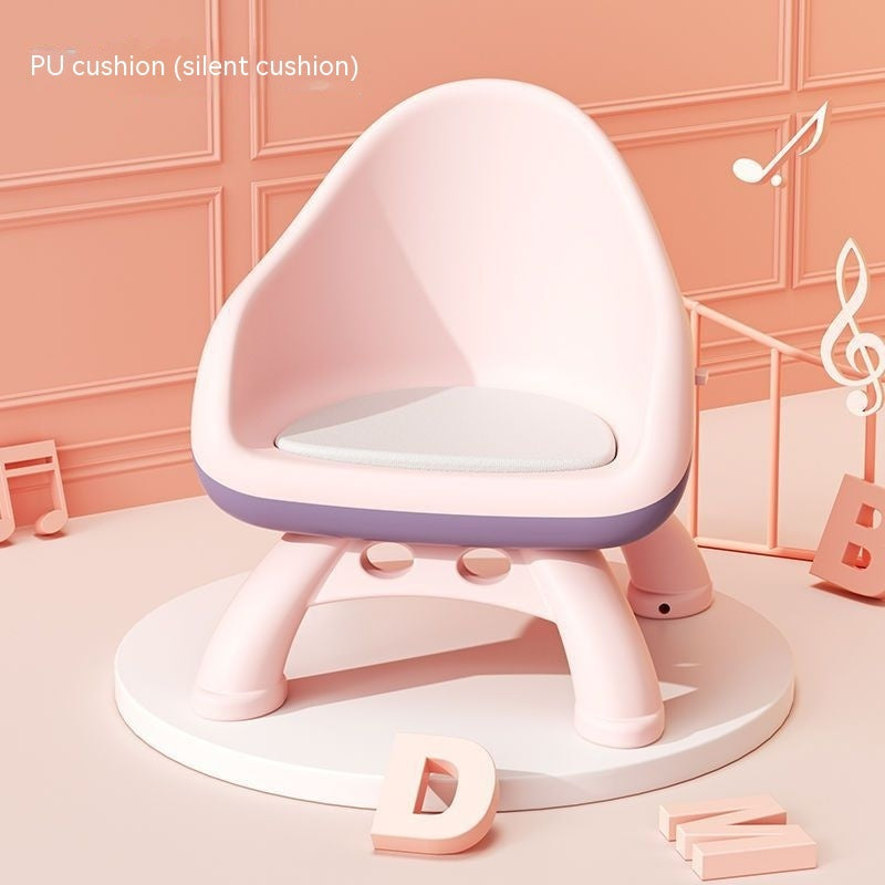 Pink and purple children's chair with a cushion on a pink background
