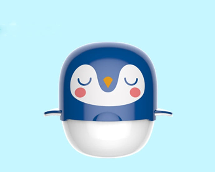 Blue penguin-shaped container on a light blue background