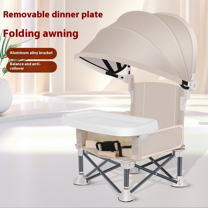 Children's chair with folding awning and removable dinner plate on a white background