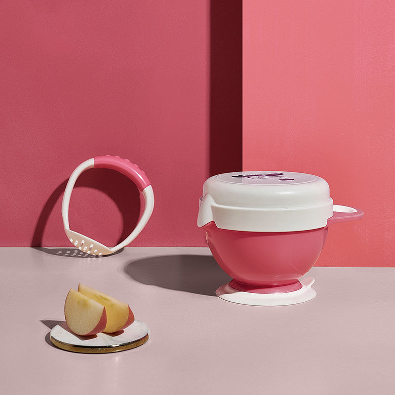 Pink and white baby feeding products on a pink background
