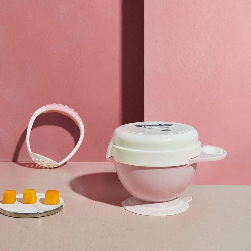 Pink baby bowl with lid on a pink background
