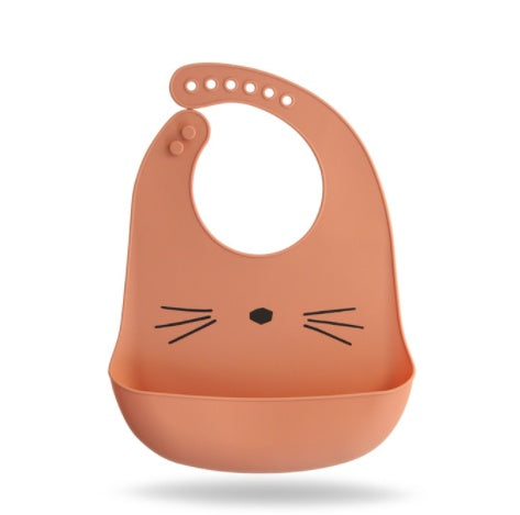Orange silicone bib with cat face design on a white background