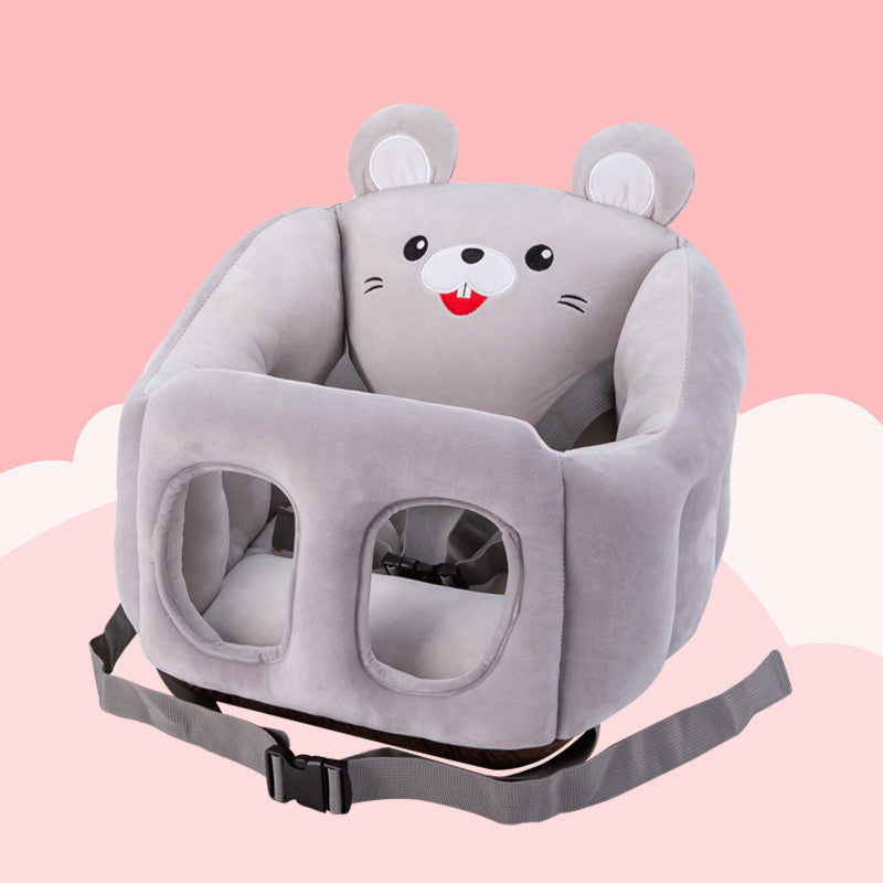 Gray baby seat with cartoon bear face design on a pink background