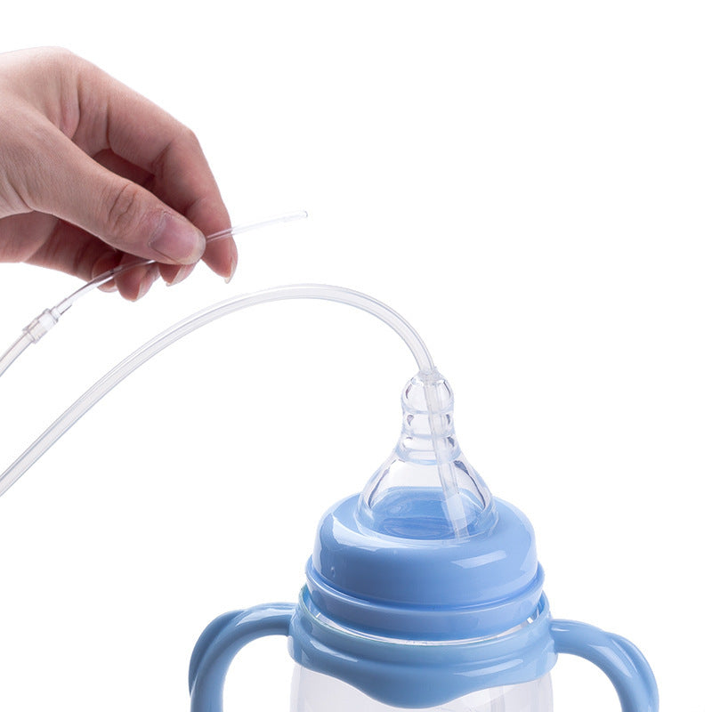 Baby bottle with blue handle and clear straw on a white background