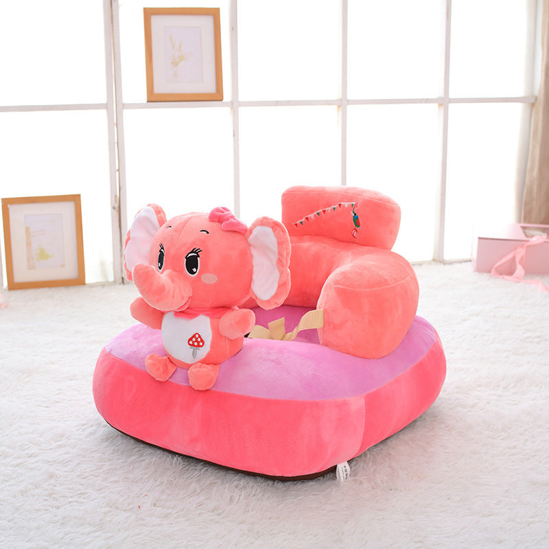 Pink elephant-shaped children's chair in a room with light-colored walls and floor.