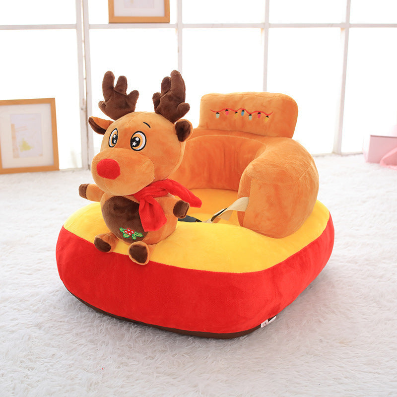 Children's reindeer-shaped bean bag chair on a light wooden floor.