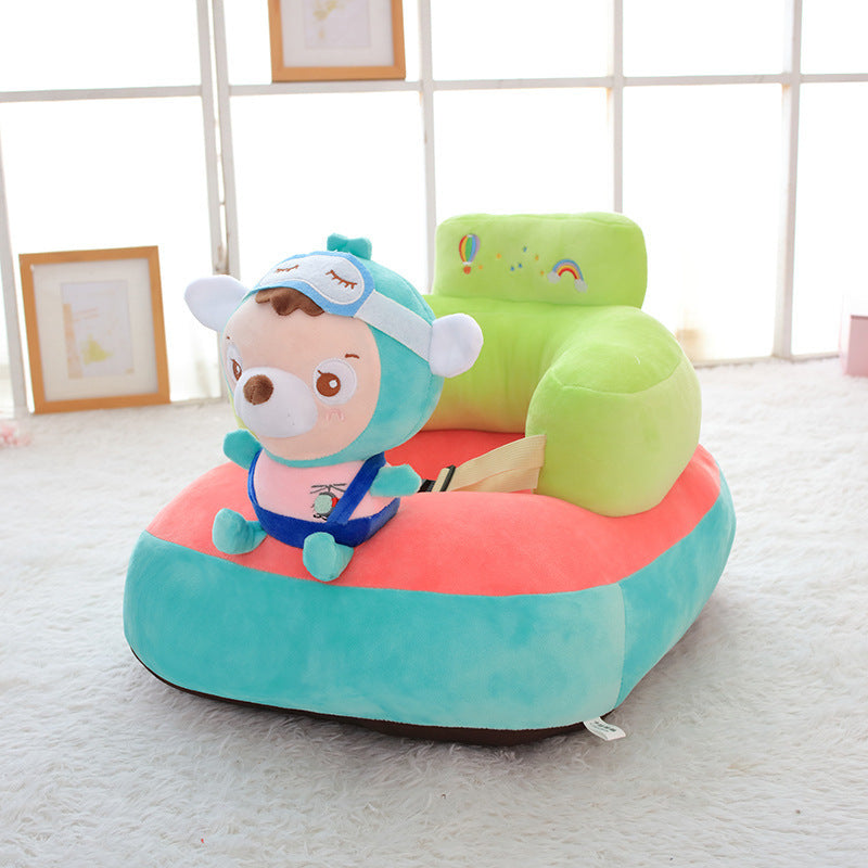 Colorful children's seat with cartoon character on a light gray floor.