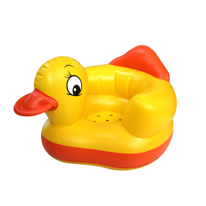 Yellow inflatable duck chair with red accents on a white background