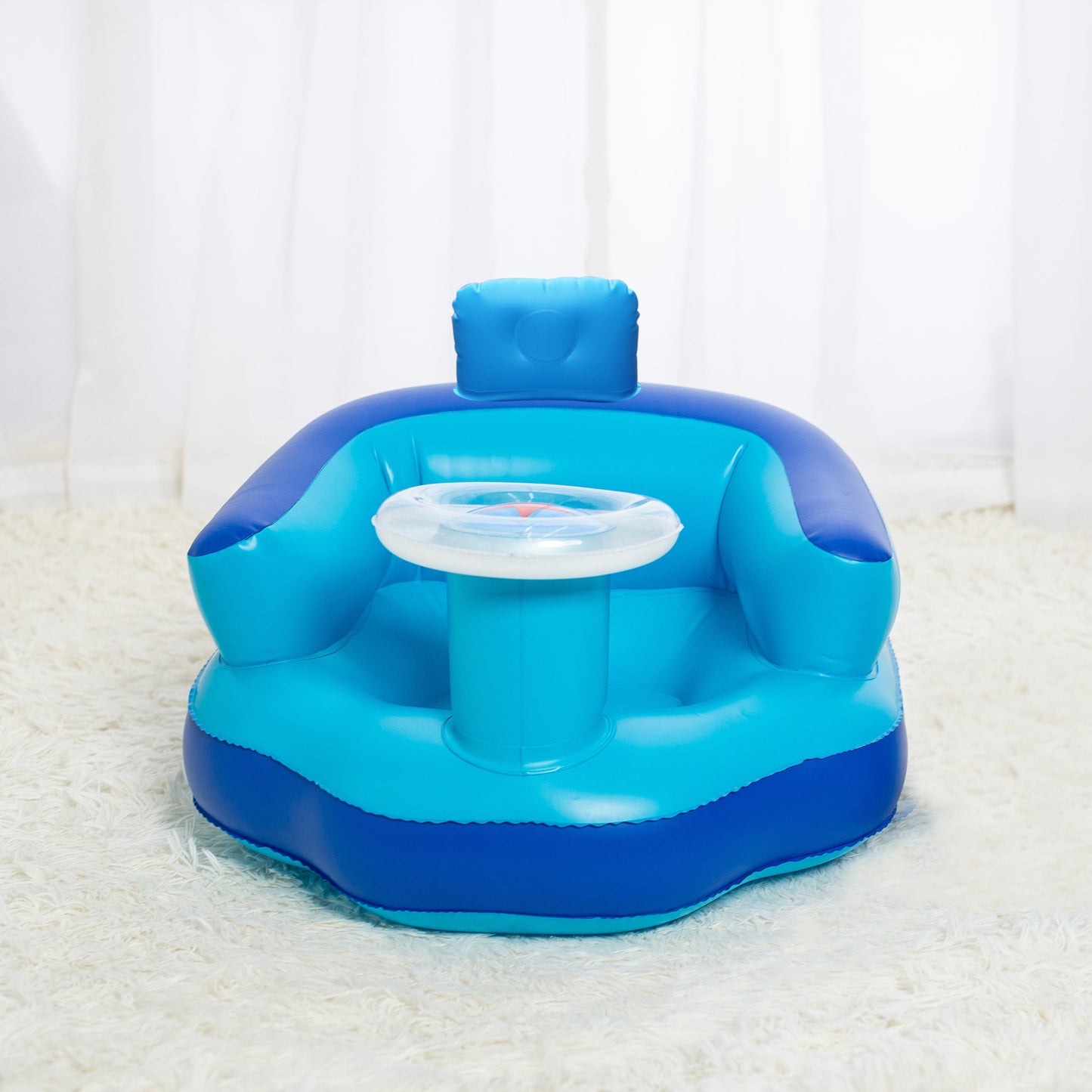 Blue inflatable baby seat with cup holder on a white background