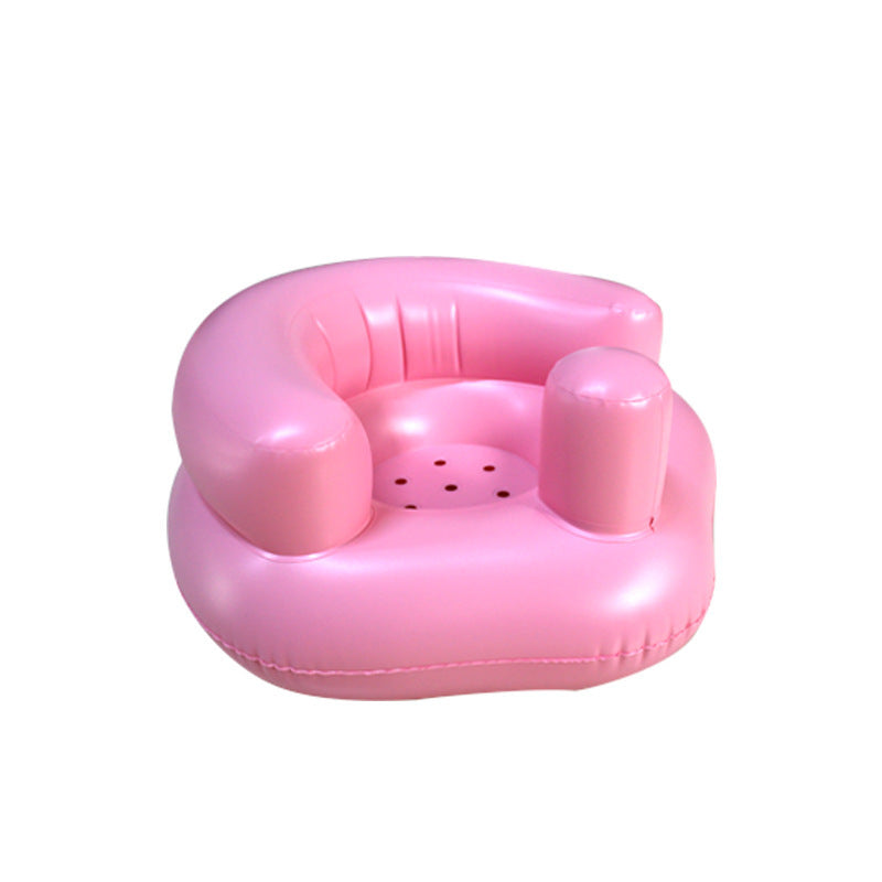 Pink inflatable chair on a white background
