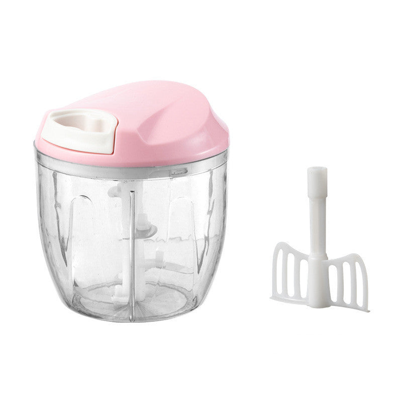 Pink and clear kitchen chopper with a white attachment on a white background