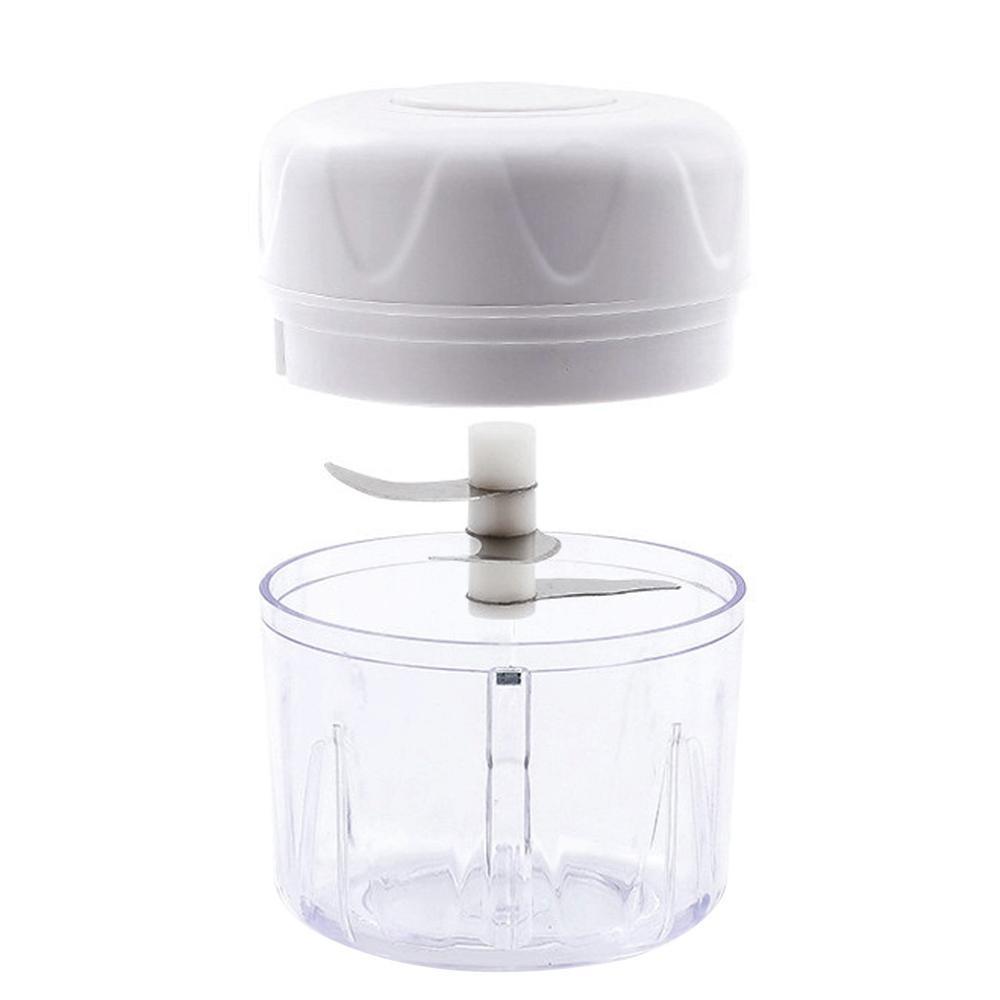 White kitchen chopper with clear container on a white background