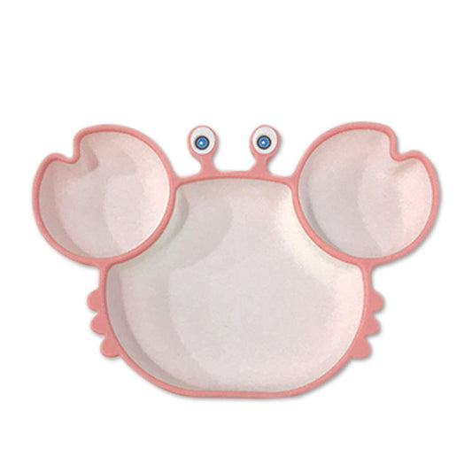 Pink crab-shaped plate with blue eyes on a white background