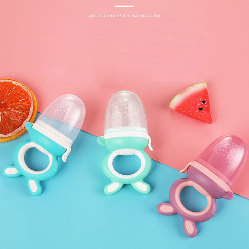 Three colorful baby pacifiers on a pink and blue gradient background with fruit slices.