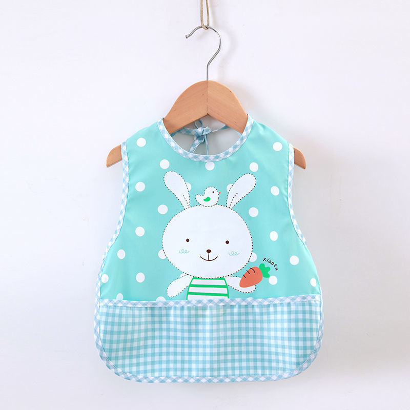 Baby bib with bunny design on a hanger against a white background