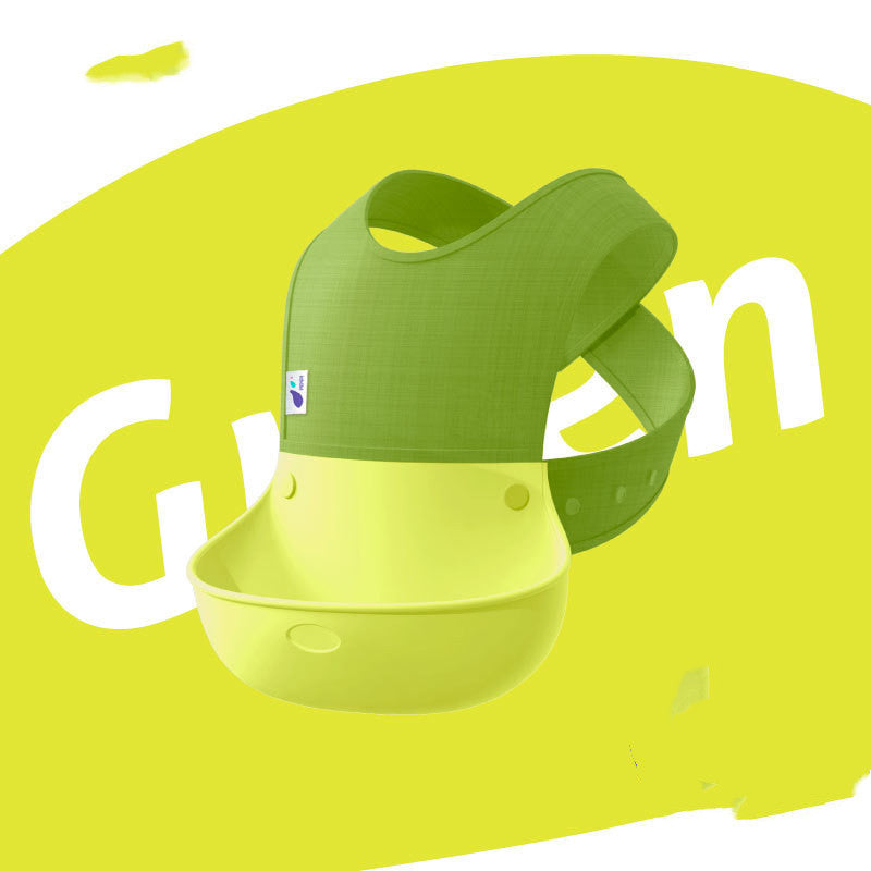 Green and yellow baby bib on a bright yellow background with 'Green' text.