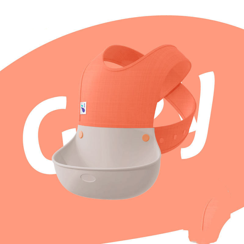 Orange and gray baby seat with a visible brand logo on a peach background