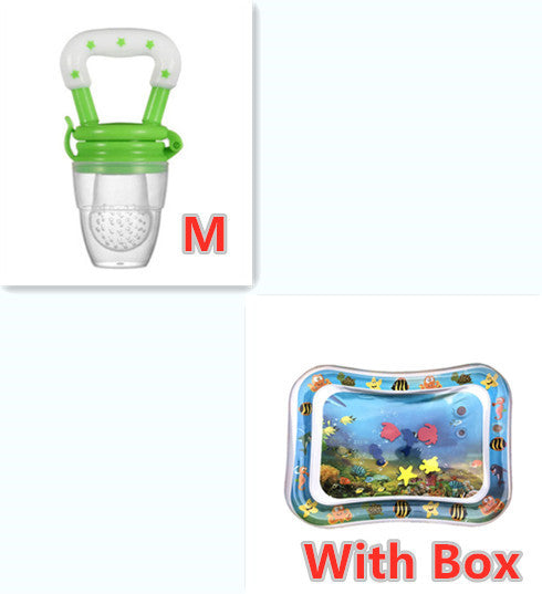 Baby fruit feeder with green handle and clear body, next to an inflatable pool with Dory from Finding Nemo on a white background.