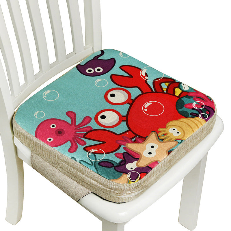 Colorful sea creature cushion on a white chair