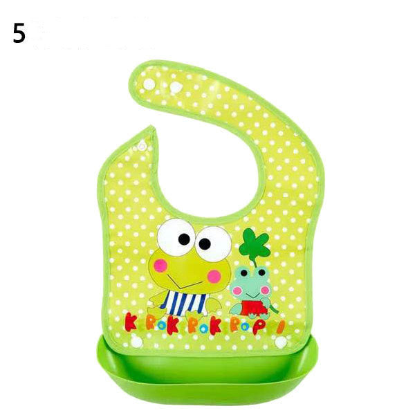 Green baby bib with frog design on a white background