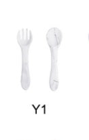 White plastic fork and spoon set on a white background with 'Y1' label.