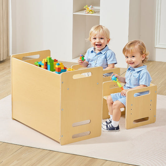 Two children playing with colorful building blocks in a wooden toy storage unit.