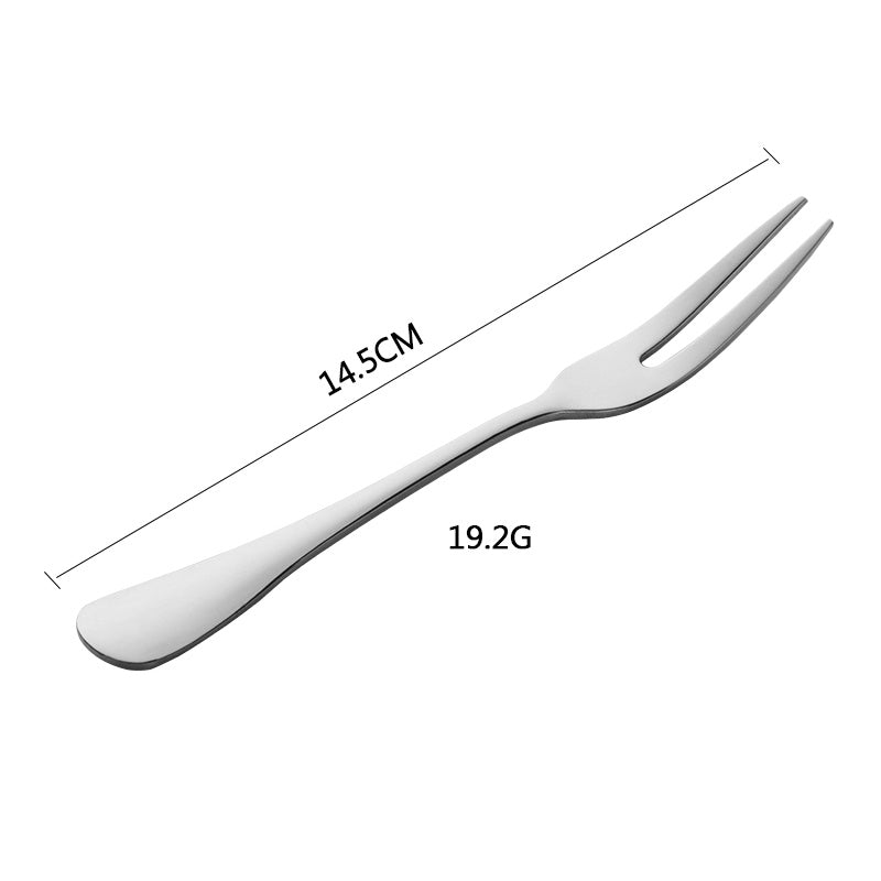 Stainless steel fork with measurements on a white background