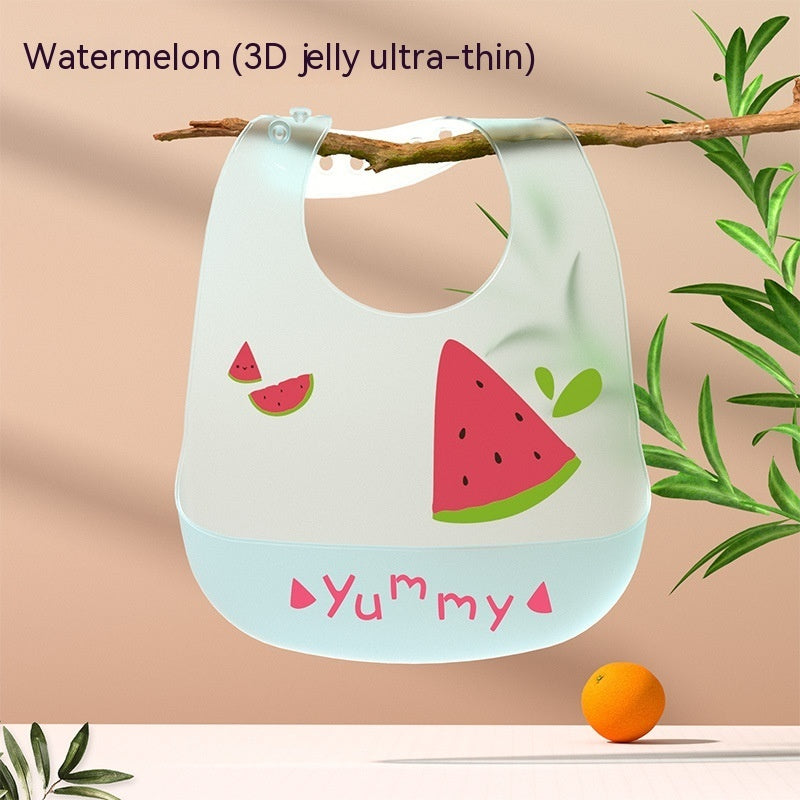 Children's bib with watermelon design and 'Yummy' text on a beige background