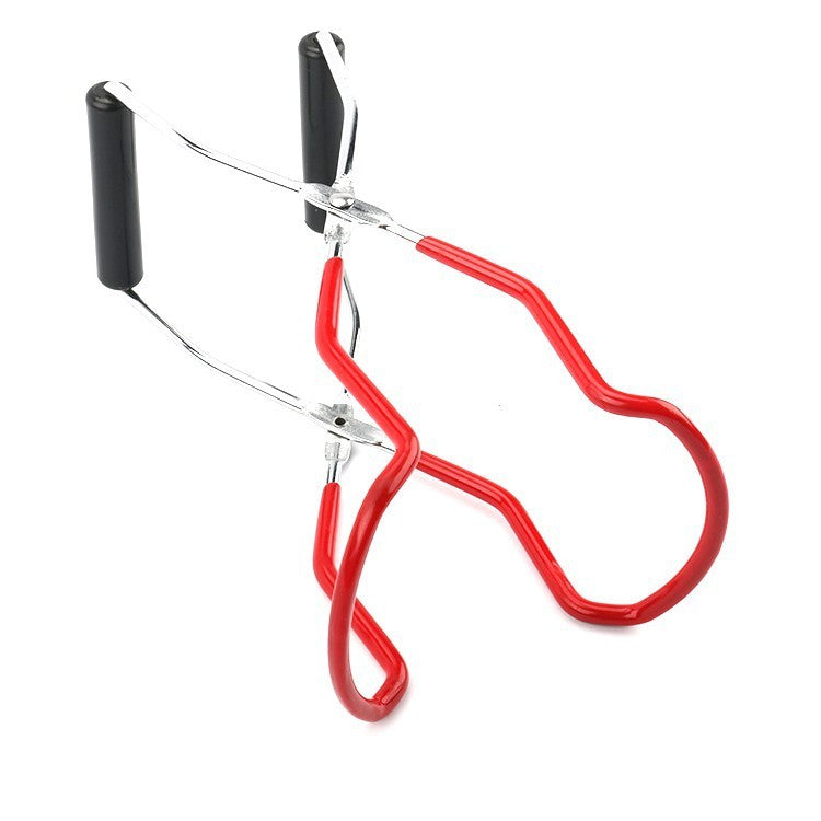 Eyelash extension tool with red handles on a white background