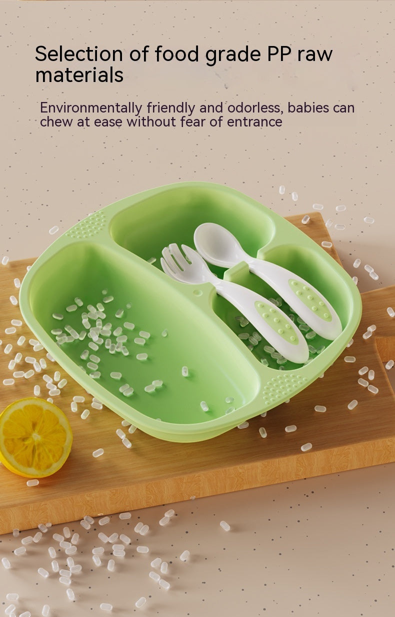 Green baby plate with white utensils on a wooden board with rice and lemon, text about food grade PP raw materials.