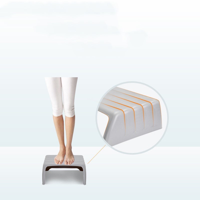 Step stool with a close-up of its textured surface on a light gray background