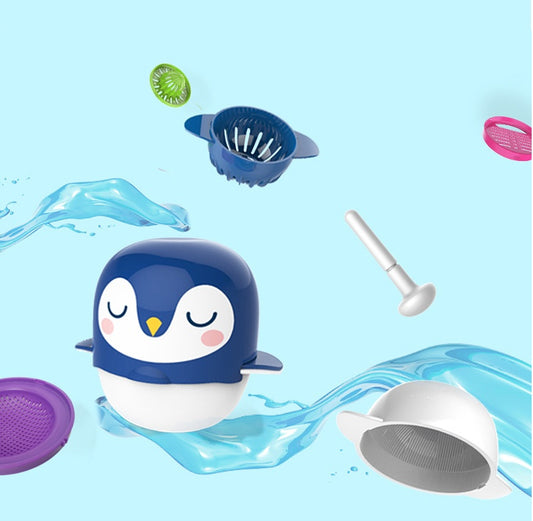 Penguin-shaped bath toy with various bath accessories on a blue water-themed background
