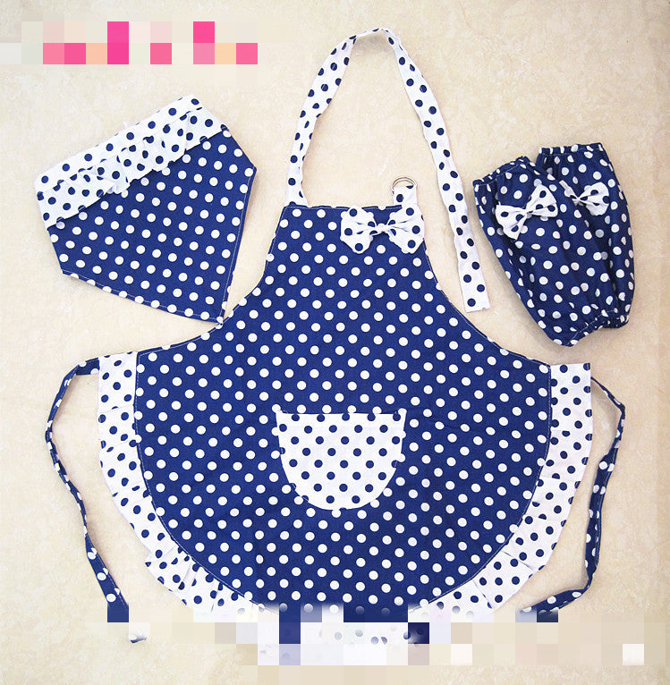 Blue polka dot apron with matching hat and bag on a beige background