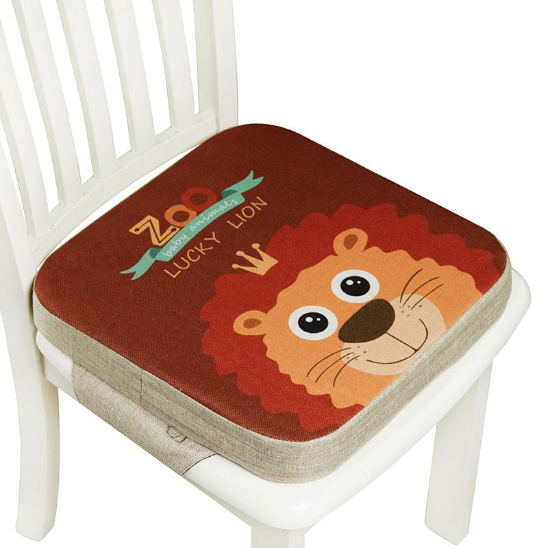 Chair cushion with a lion design and 'Zoo Lucky Lion' text on a white chair.