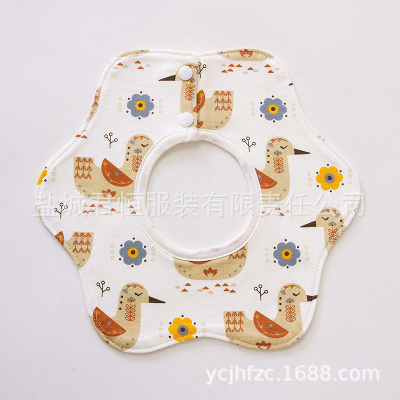 Baby bib with bird pattern on a white background