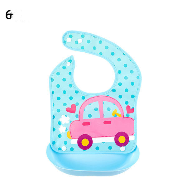 Baby bib with pink car design on a blue polka dot background