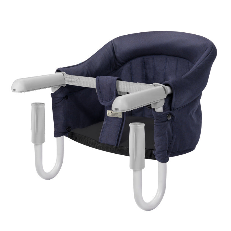 Navy blue baby high chair with white armrests on a white background