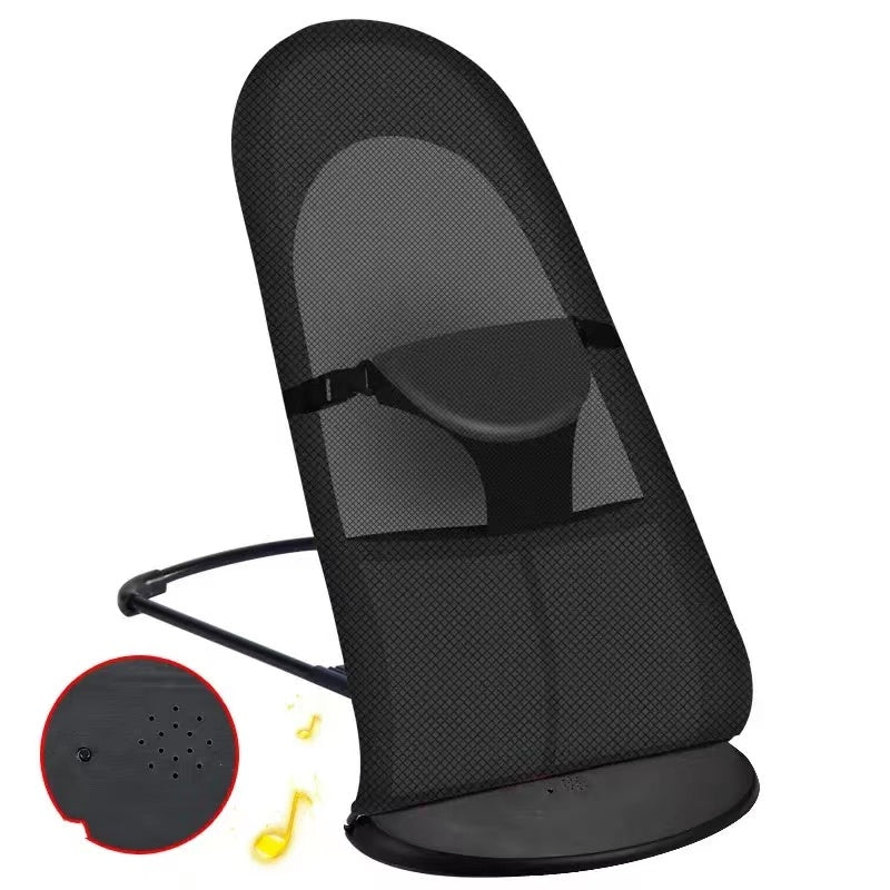 Black baby bouncer with additional accessories on a white background