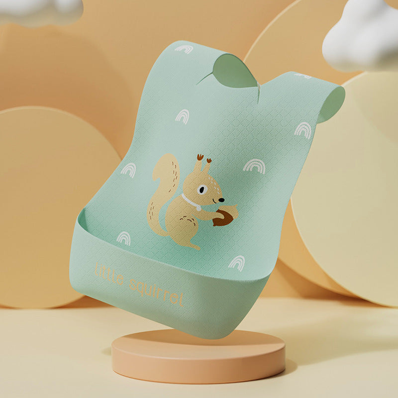 Green children's bib with a squirrel design on a beige background
