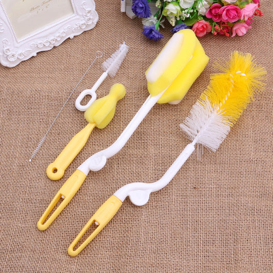Set of three yellow and white cleaning brushes on a textured surface with flowers in the background.