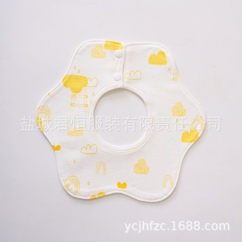 Baby bib with yellow patterns on a white background