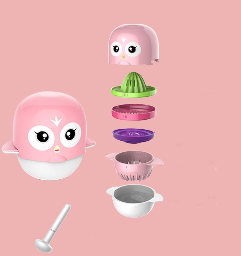 Pink owl-shaped kitchen tool with detachable parts on a pink background