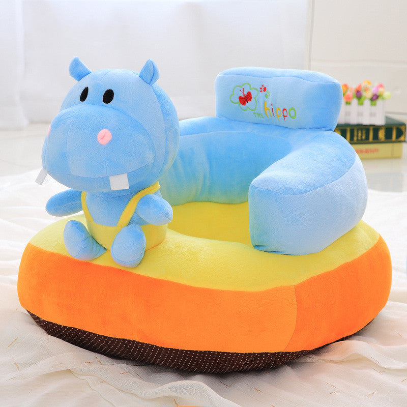 Children's plush hippo toy with a colorful base on a light background